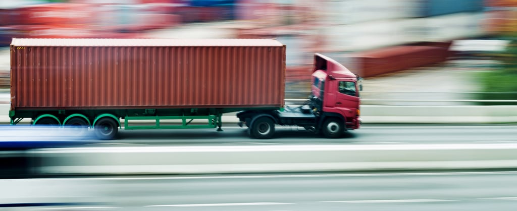 Container truck in motion